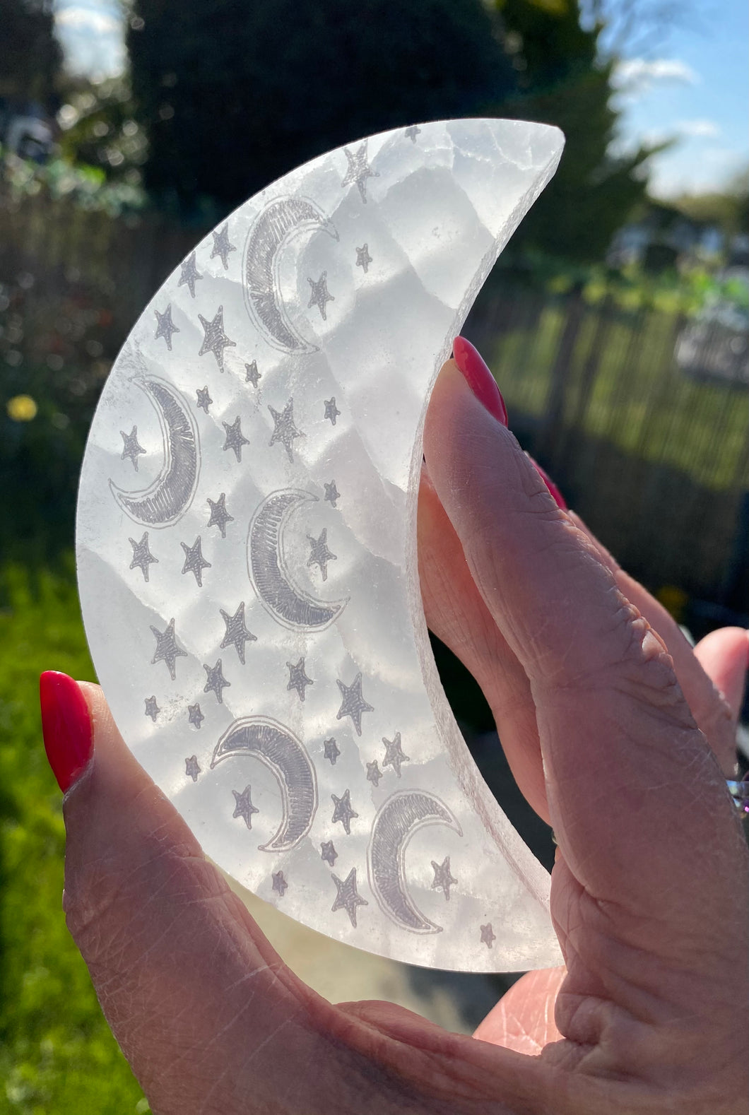 Selenite carved crescent moons